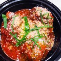 Homemade Sicilian Meatballs · Pork, veal and beef, ricotta and Parmesan meatballs slowly simmered in tomato sauce.