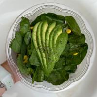 Cali Corn Salad · Baby spinach, avocado, cherry tomatoes, corn, black beans, cucumbers, green onions, lime jui...