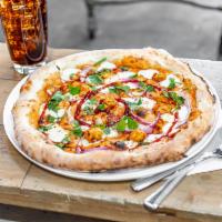 BBQ Chicken Pizza  · BBQ sauce, chicken, red onions, mozzarella, cilantro, paprika 