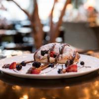 Signature Nutella Calzone · Nutella, strawberries, blackberries, blueberries and balsamic reduction.