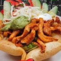 Taco Salad · Crispy fried tortilla filled with romaine lettuce, your choice of meat, beans, cheese, pico ...