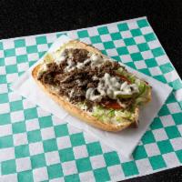 Steak and Cheese Sandwich · Grilled steak and provolone cheese with grilled peppers and onions.