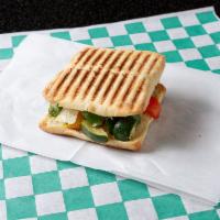 Grilled Veggies Panini · Freshly grilled veggies (carrots, onions, zucchini, red, yellow or green bell peppers), feta...