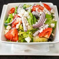 Greek Salad · Lettuce, tomato, cucumbers, green peppers, olives, red onions and feta cheese.