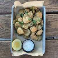 Crunchy Pickle Chips · Beer-battered pickle chips. Served with buttermilk ranch, lemon, cilantro.
Vegan option avai...