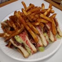 BLT Club Sandwich  · One layee of lettuce, tomato, mayo, and bacon on top of another layer of lettuce, tomato, ma...