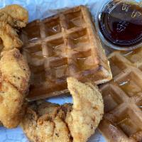 Chicken & Waffles · 3 pieces of chicken prepared Southern style with 2 golden waffles.