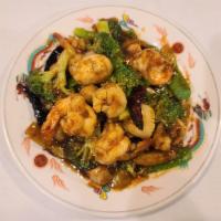 Szechuan Trio · Jumbo shrimp, scallop, sliced chicken and vegetables in a hot spicy sauce. Spicy.