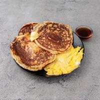 Golden Brown Pancake with 2 Eggs Any Style · 
