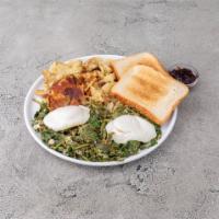 Egg Florentine · Feta cheese with spinach sauteed, topped with 2 poached eggs. Served with potato and toast.