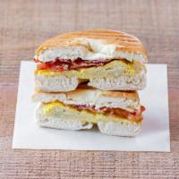 Bacon, Egg and Cheese · Bacon with a fluffy scrambled egg topped with American cheese on your choice of bagel smashe...
