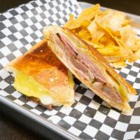 The Ybor Original - Tampa Cuban Sandwich · Glazed ham, roasted pork, Genoa salami, Swiss cheese, pickle, home-made mustard sauce, Cuban...