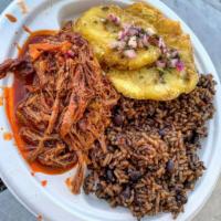 Ropa Vieja Cubana · Shredded beef with choice of rice, one side, and sauce.