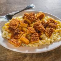 Buffalo Mac · Homemade mac and cheese topped with crispy chicken tossed in Urbano's Buffalo sauce.