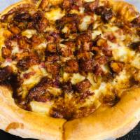 BBQ Chicken Pizza · Maple bourbon BBQ sauce, fried chicken, onions & tasty bacon.