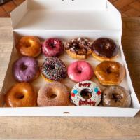 Donna PK · 1 dozen assorted donuts, 1 dozen (6 glazed and 6 chocolate donuts) donuts, 1 dozen sausage r...