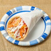 Chicken Gyro on Pita · Warm pita bread filled with chicken  gyro. We add in lettuce, tomatoes, your choice of toppi...