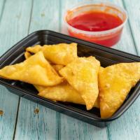 Fried Crab Rangoon （气云吞） · 8 pieces. Filled crisp dumpling appetizers. Served with choice of sauce.