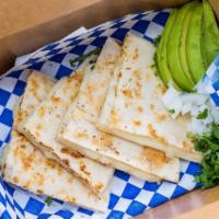 Kids Quesadilla · Cooked tortilla that is filled with cheese and folded in 1/2. 