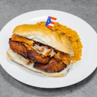 Pulled Pork With Sweet Plantains (Lechón Y Maduro Sandwich) · Served with arroz con gondolas or white rice and beans.