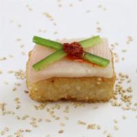 Crispy Rice with Yellowtail · Buttery mild fish.