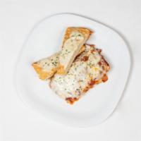 Lasagna · Served with ground beef, ricotta, mozzarella and Parmesan cheese.
