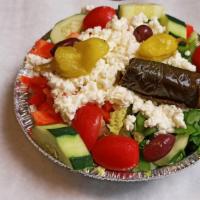Greek Salad · Fresh mixture of romaine and iceberg lettuce topped with Kalamata olives, pepperoncini, feta...