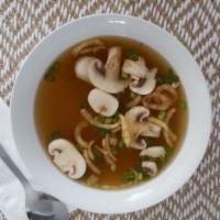 Clear Soup  · Mushroom, scallion and fried red onion