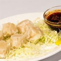 Shumai · 6 pieces Steamed shrimp dumpling in gyoza sauce
Choose steamed or fried 