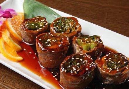 Beef Negimaki · 6 pcs of rolled beef with scallion in teriyaki sauce.