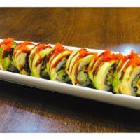 Dragon Roll · 8 pcs Eel and cucumber inside w. avocado masago on the top and chef' special sacue