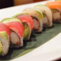 Rainbow Roll · 8-Pcs crab meat cucumber and avocado wrapped w. assorted fish and avocado 