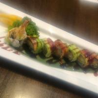 Samurai Roll · shrimp tempura ,cucumber inside w. eel avocado scallion masago on top in eel sauce 