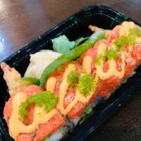 Angel roll · Shrimp tempura, mango avocado inside topped with spicy tuna ,green tobiko and chef’s special...