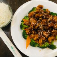 Sesame Chicken Entree · Deep fried big chunks chicken with broccoli and carrot onside topped with sesame seeds serve...
