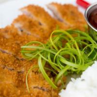 Pork Katsu(D) · Meat cutlets in breaded batter with homemade sauce on the side. Served with miso soup or gar...
