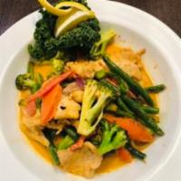 Red Panang Curry(D) · Medium red curry paste with carrots, bell peppers, broccoli, onion ,string bean with coconut...