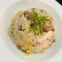 Japanese Style Fried Rice · Pan-fried white Japanese rice with peas corn mushroom cabbage carrot choice of chicken, beef...
