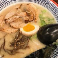 Tonkotsu Ramen · Pork richest broth. Topped with braised pork belly, soft seasoned broiled egg, bamboo shoots...