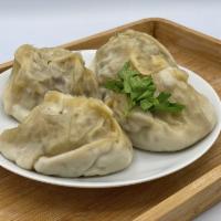 Manti ·  Beef dumplings served steamed (4pc)
