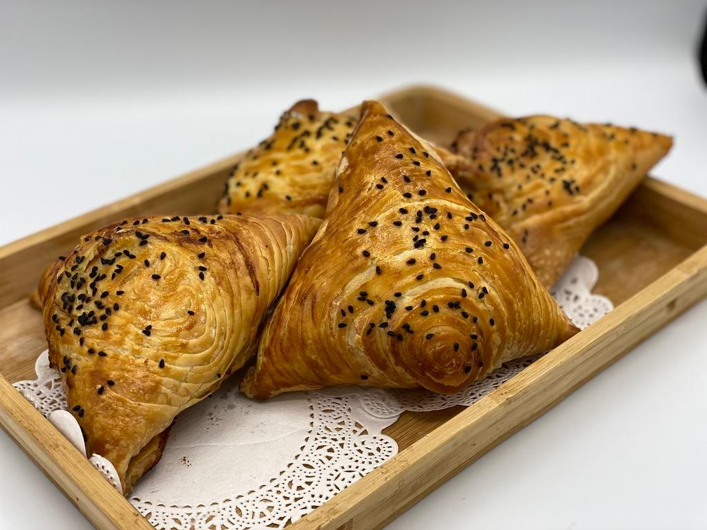 Samsa (beef) · Beef, aromatic spices mixed with onions and stuffed in a crispy pastry