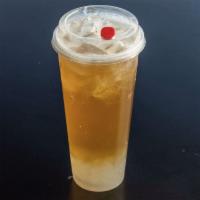 Golden Crystal · Fresh brew organic Peach oolong tea with crystal boba. 22 oz.