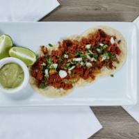 Tuna al Pastor Tacos · 3 corn tortillas topped with our unique tuna pastor with fresh onions and cilantro and our s...