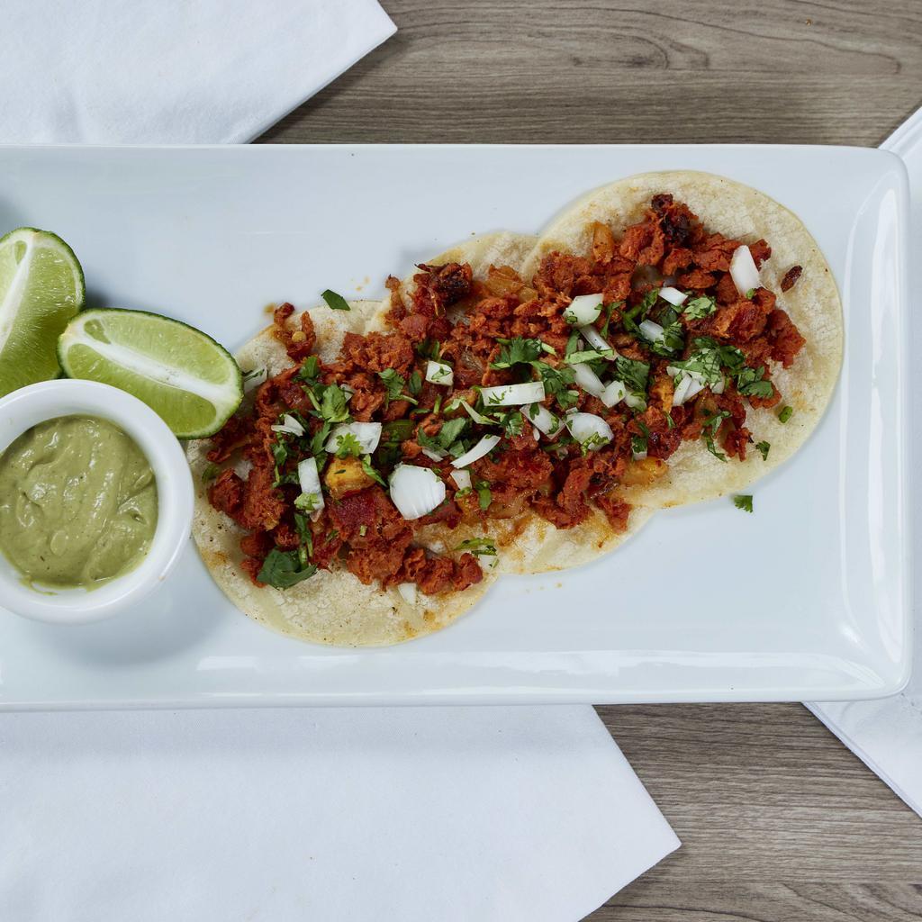 Tuna al Pastor Tacos · 3 corn tortillas topped with our unique tuna pastor with fresh onions and cilantro and our secret sauce.