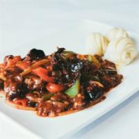 Beef Katlima * · Marinated beef fried with spices, green pepper, onions, black mushrooms, oyster-flavored sau...