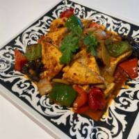 Fried Tofu * · Green and red bell peppers, onions, dry black fungus, soy sauce, sugar, vinegar and tomato p...