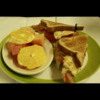 N8. Fried Egg Sandwich · Fried eggs, bacon, lettuce, tomato, and American cheese on sourdough bread.