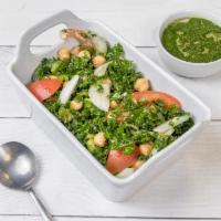 Kale Salad · Chopped kale topped with hemp seeds and crushed garbanzo beans.
