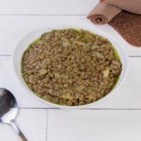 Brown Lentils Wot (mild) · Split lentils cooked with turmeric, garlic and other spices.
