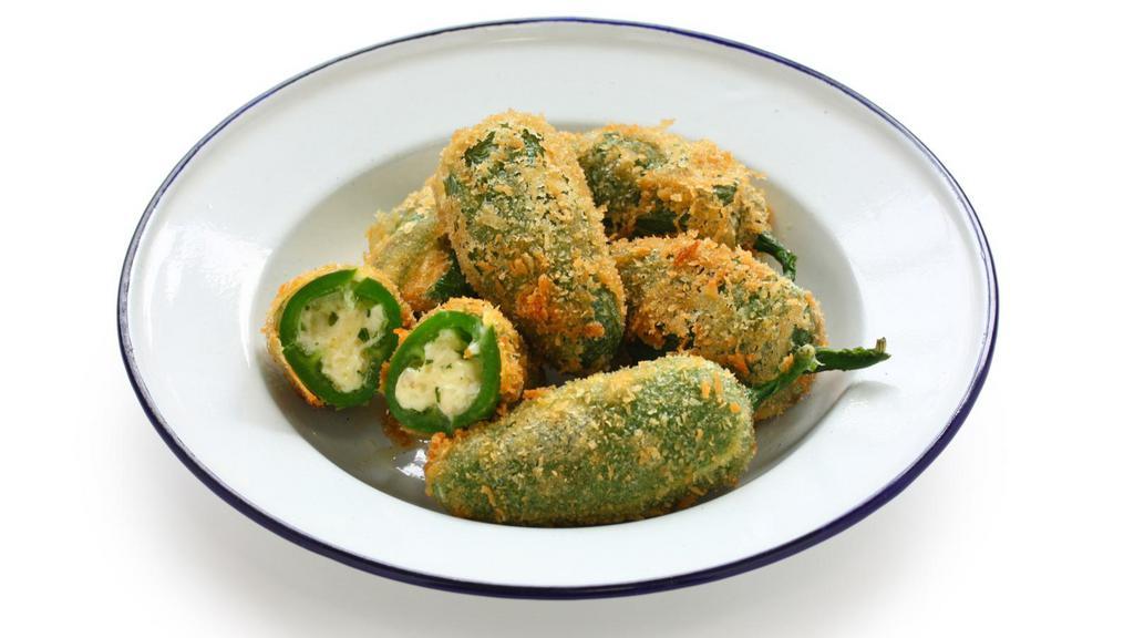 Jalapeno Poppers · Fried jalapeno and cream cheese poppers served with marinara sauce.